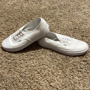 Womens size 9, Mens size 7.5. White lace up vans.